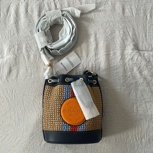 BRAND NEW COACH Mini Bucket bag on Navy leather and natural. With Gold details.